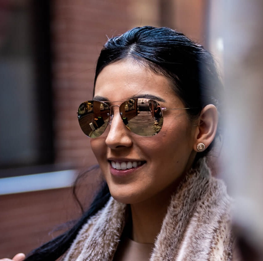 Female Model wearing Aviator Sunglasses  - Epoch Eyewear