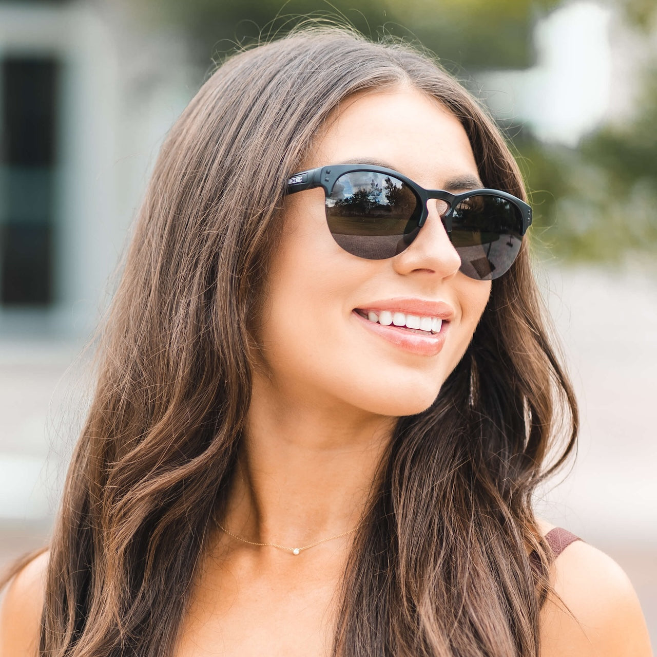 woman wearing black sierra sunglasses